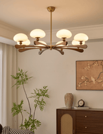 Evander Ray Modern Wood and Brass Chandelier with Glass Shades