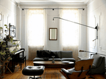 Modern Swing Arm Wall Sconce with Extended Reach in Matte Black