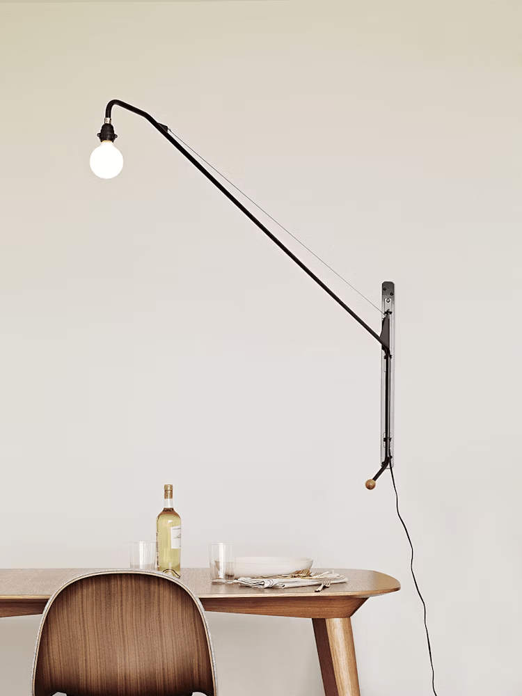 Modern Swing Arm Wall Sconce with Extended Reach in Matte Black