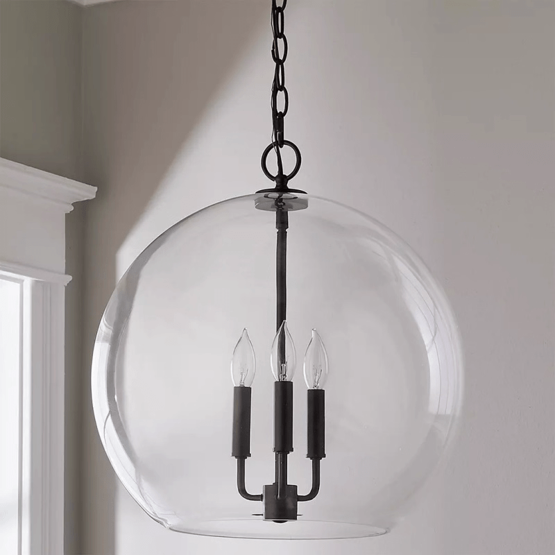 Lysander Clear Glass Globe Pendant Light in Aged Brass