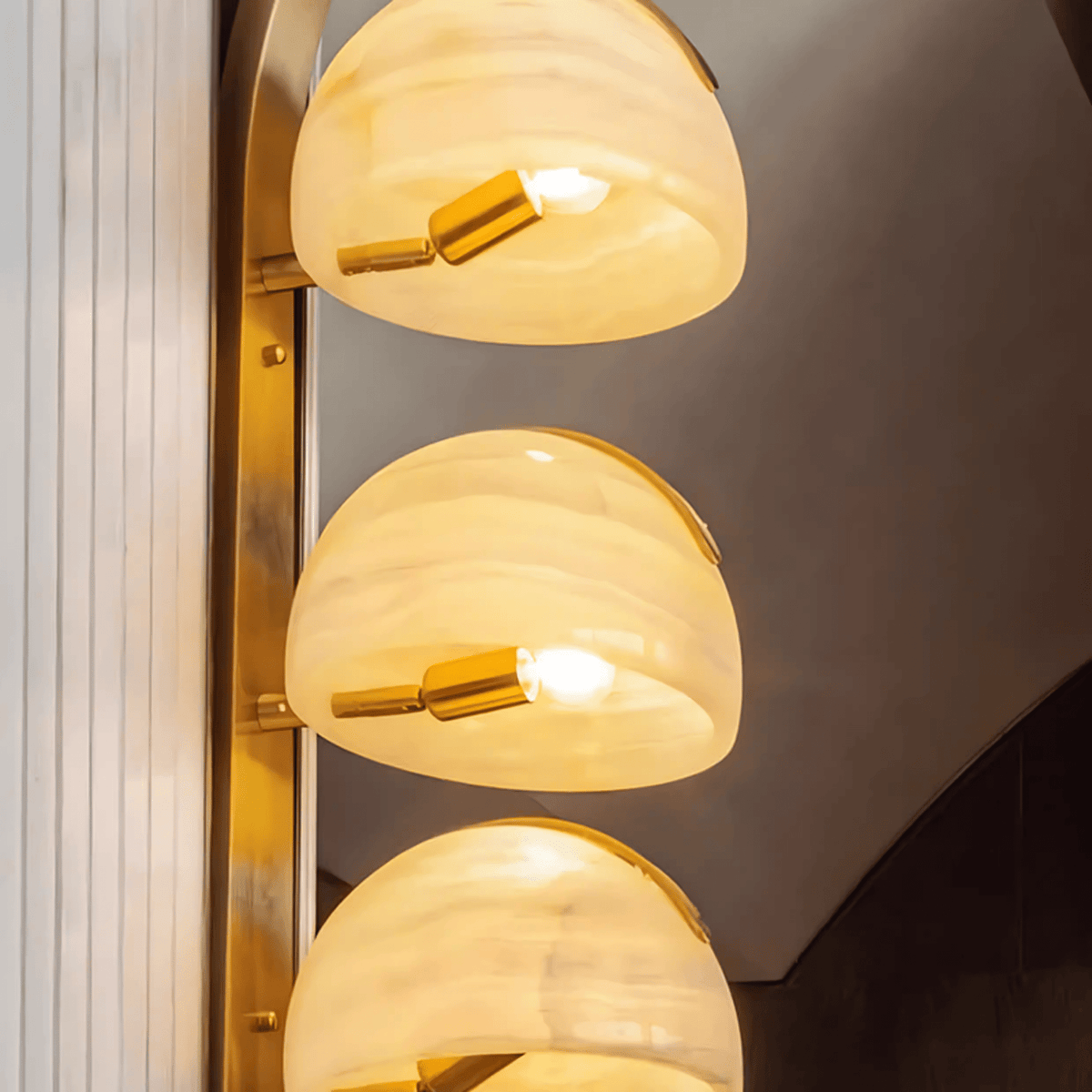 Orvyn Alabaster Wall Sconce in Brass — Modern Sculptural Lighting