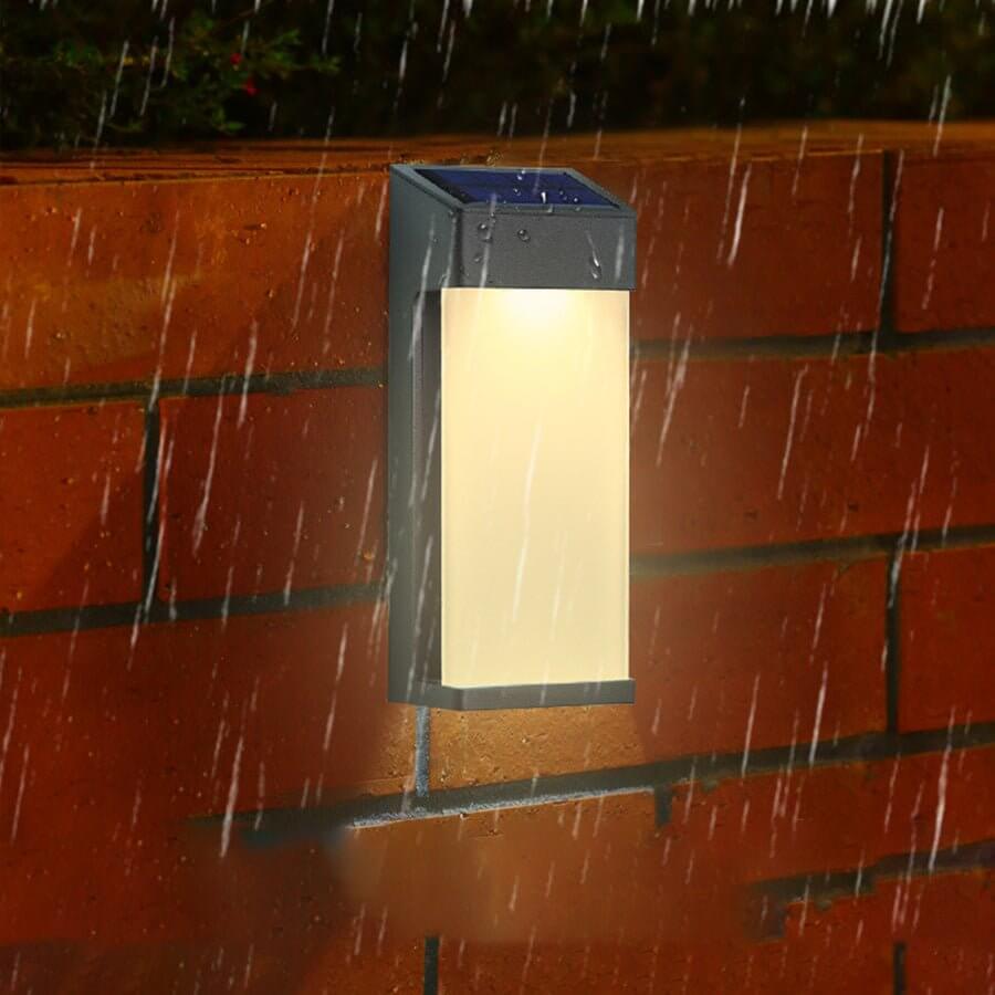 Solar LED Wall Sconce Set of Two in Black with Glass Shade for Modern Outdoor Spaces
