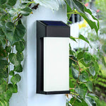 Solar LED Wall Sconce Set of Two in Black with Glass Shade for Modern Outdoor Spaces