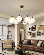 Aurora Loop Modern Chandelier with Walnut Accents and Glass Globes