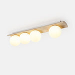 Orélie Modern Travertine Ceiling Light with Frosted Glass Globes