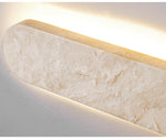 Lior Sculptural Travertine LED Wall Sconce for Modern Interiors