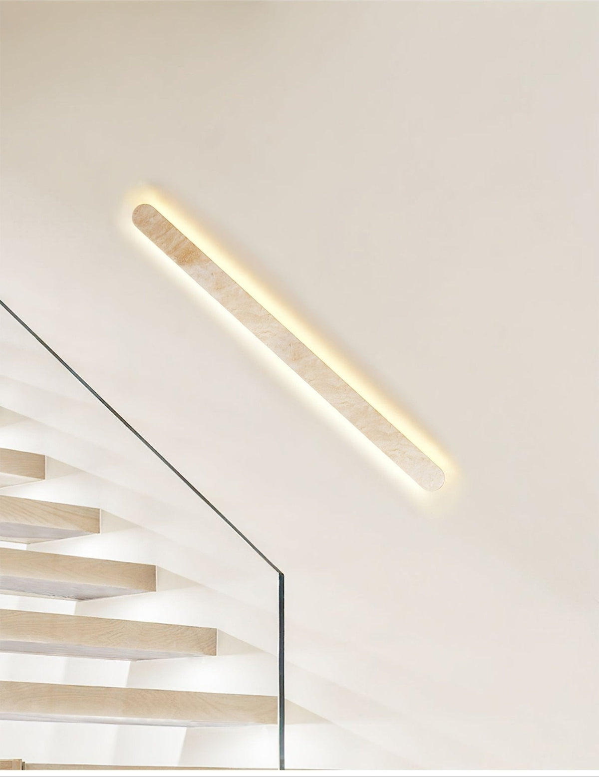 Lior Sculptural Travertine LED Wall Sconce for Modern Interiors