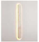 Lior Sculptural Travertine LED Wall Sconce for Modern Interiors