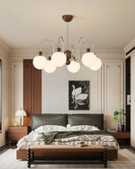 Aurora Loop Modern Chandelier with Walnut Accents and Glass Globes