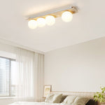 Orélie Modern Travertine Ceiling Light with Frosted Glass Globes