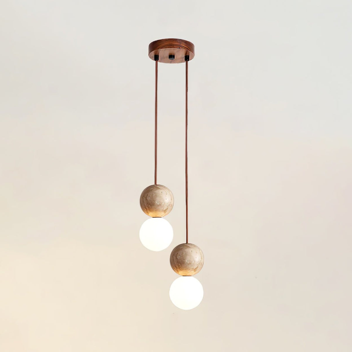 Camille Travertine Pendant Light – Natural Stone Sphere with Opal Glass Globe