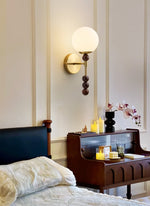 Colette Globe Wall Sconce in Gold or Walnut | Modern Luxury Lighting