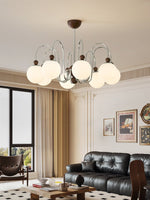 Aurora Loop Modern Chandelier with Walnut Accents and Glass Globes