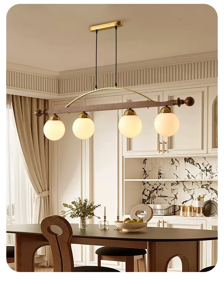 Adorned Linear Chandelier in Walnut and Brass with Glass Orbs