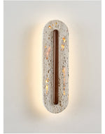 Aerin Lumaslot Wall Sconce in Natural Travertine with Warm LED Glow