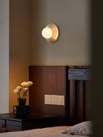 Round Alabaster Orb Wall Sconce in Brass for Modern Interiors