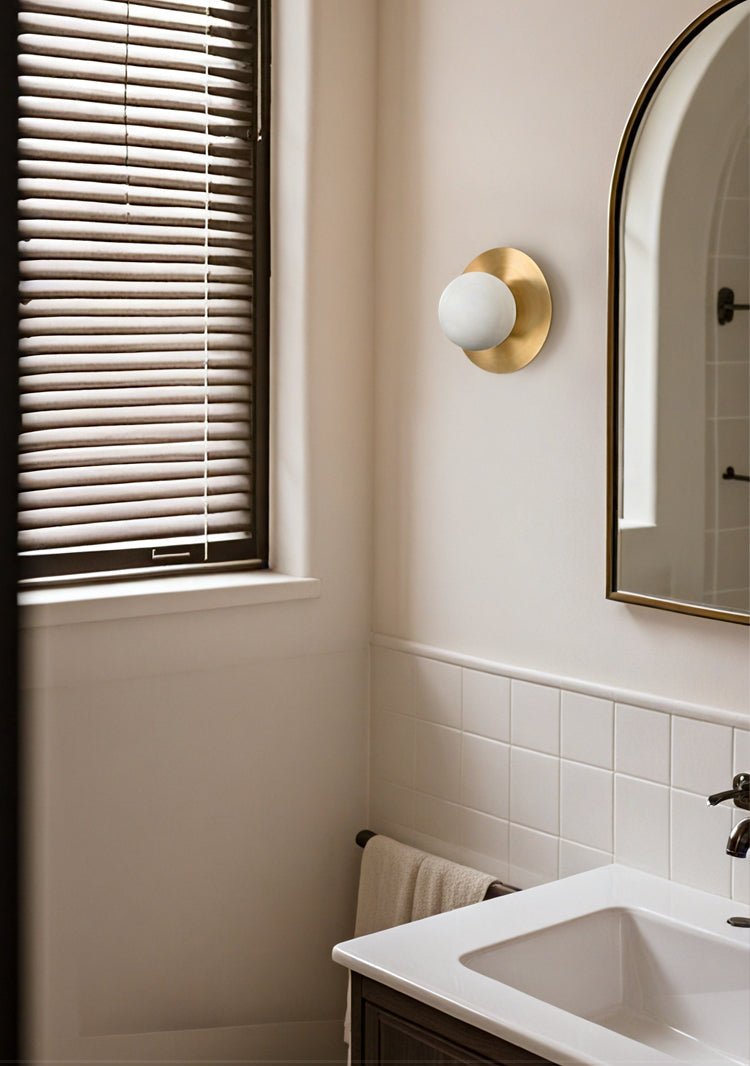 Round Alabaster Orb Wall Sconce in Brass for Modern Interiors