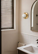 Round Alabaster Orb Wall Sconce in Brass for Modern Interiors