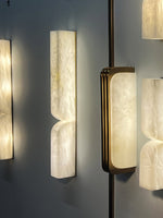 Alabaster Essence Plug-In Wall Sconce in Gold or Black