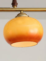 Amber Trio Pendant Light – Brass & Wood Linear Chandelier