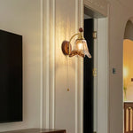 Amberveil Bloom Wall Sconce with Amber Glass Shade and Brass Accents
