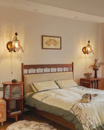 Amberveil Bloom Wall Sconce with Amber Glass Shade and Brass Accents