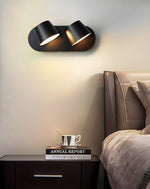 Lumina 360° Adjustable Plug-In LED Wall Sconce in Black or White