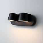 Lumina 360° Adjustable Plug-In LED Wall Sconce in Black or White