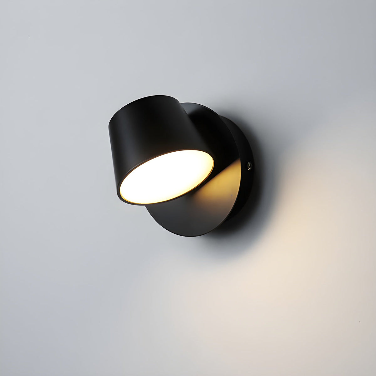 Lumina 360° Adjustable Plug-In LED Wall Sconce in Black or White