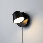 Lumina 360° Adjustable Plug-In LED Wall Sconce in Black or White