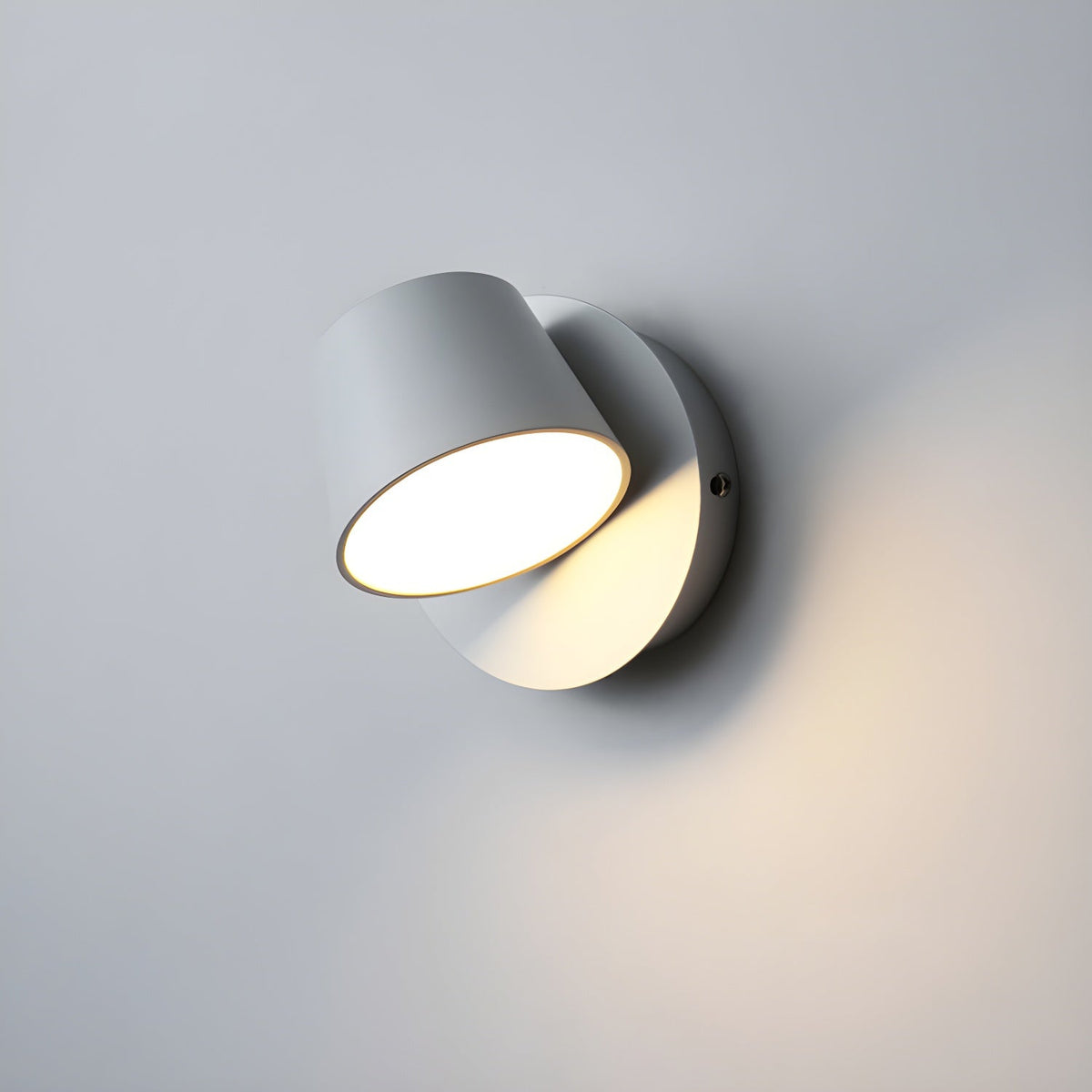 Lumina 360° Adjustable Plug-In LED Wall Sconce in Black or White