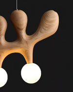 Sculptural Wooden Pendant Light with Brass Accents for Modern Interiors