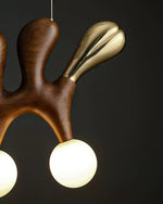 Sculptural Wooden Pendant Light with Brass Accents for Modern Interiors