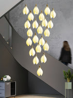 Astralis Bloom Staircase Chandelier – Modern Ceramic Petal Cascade in Gold