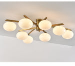 Astrora Globe Ceiling Light – Opal Glass & Brass Modern Chandelier