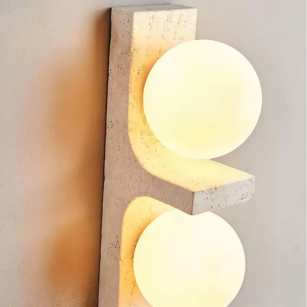 asymmetrical-travertine-wall-sconce