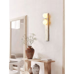 asymmetrical-travertine-wall-sconce