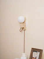 Atlas Globe Wall Sconce in Travertine and Opal Glass