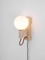 Atlas Globe Wall Sconce in Travertine and Opal Glass