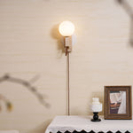 Atlas Globe Wall Sconce in Travertine and Opal Glass