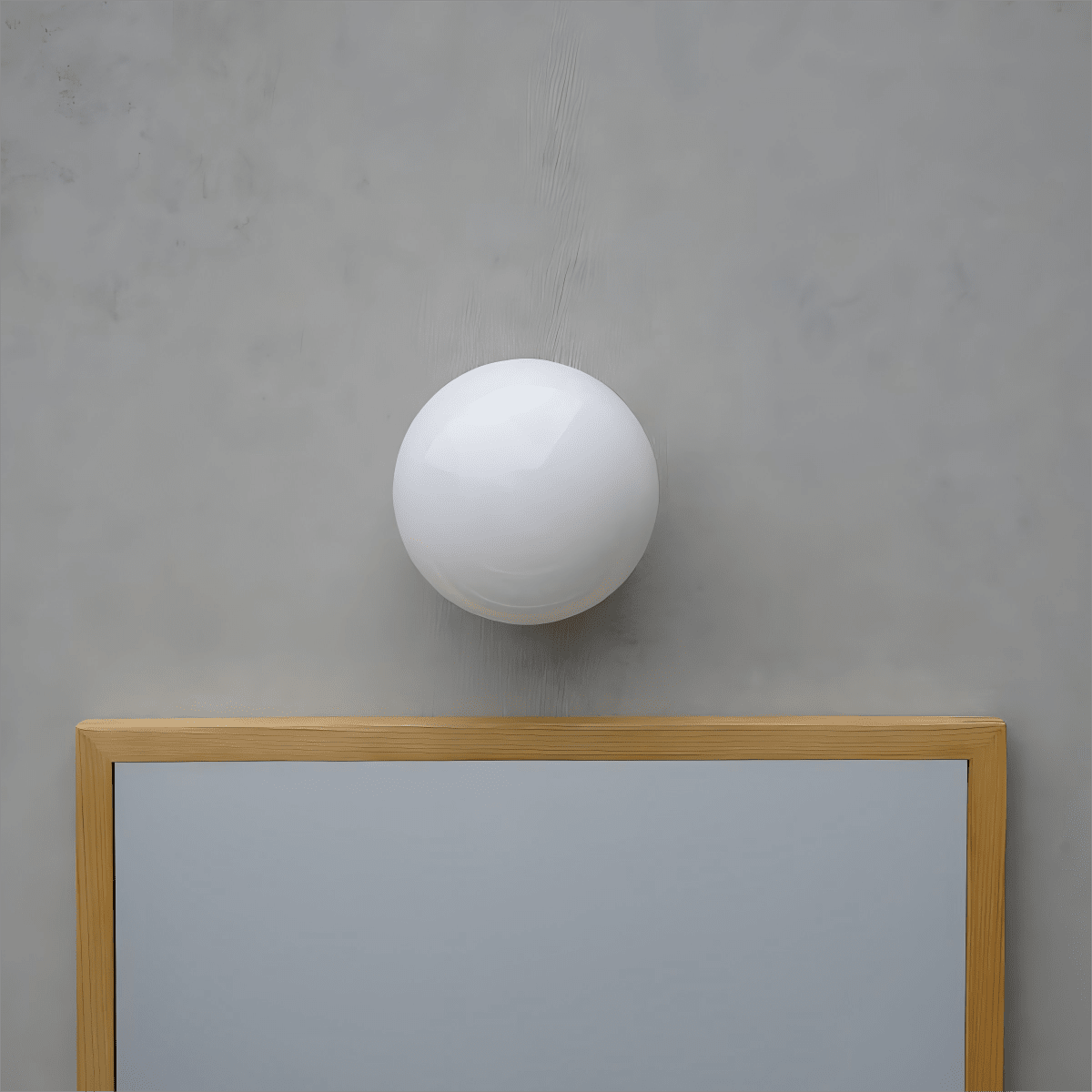 Aura Globe Glass Wall Sconce in Brass for Modern Interiors