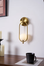 Aurea Brass Wall Sconce – Modern Minimalist Oval Glass Wall Light