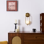 Aurea Brass Wall Sconce – Modern Minimalist Oval Glass Wall Light