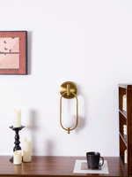 Aurea Brass Wall Sconce – Modern Minimalist Oval Glass Wall Light