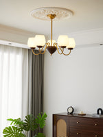 Aurorium Modern Brass Chandelier with Walnut Accents and Glass Globes
