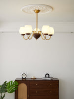 Aurorium Modern Brass Chandelier with Walnut Accents and Glass Globes
