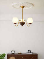 Aurorium Modern Brass Chandelier with Walnut Accents and Glass Globes