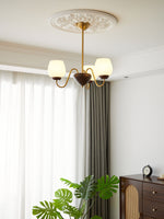 Aurorium Modern Brass Chandelier with Walnut Accents and Glass Globes