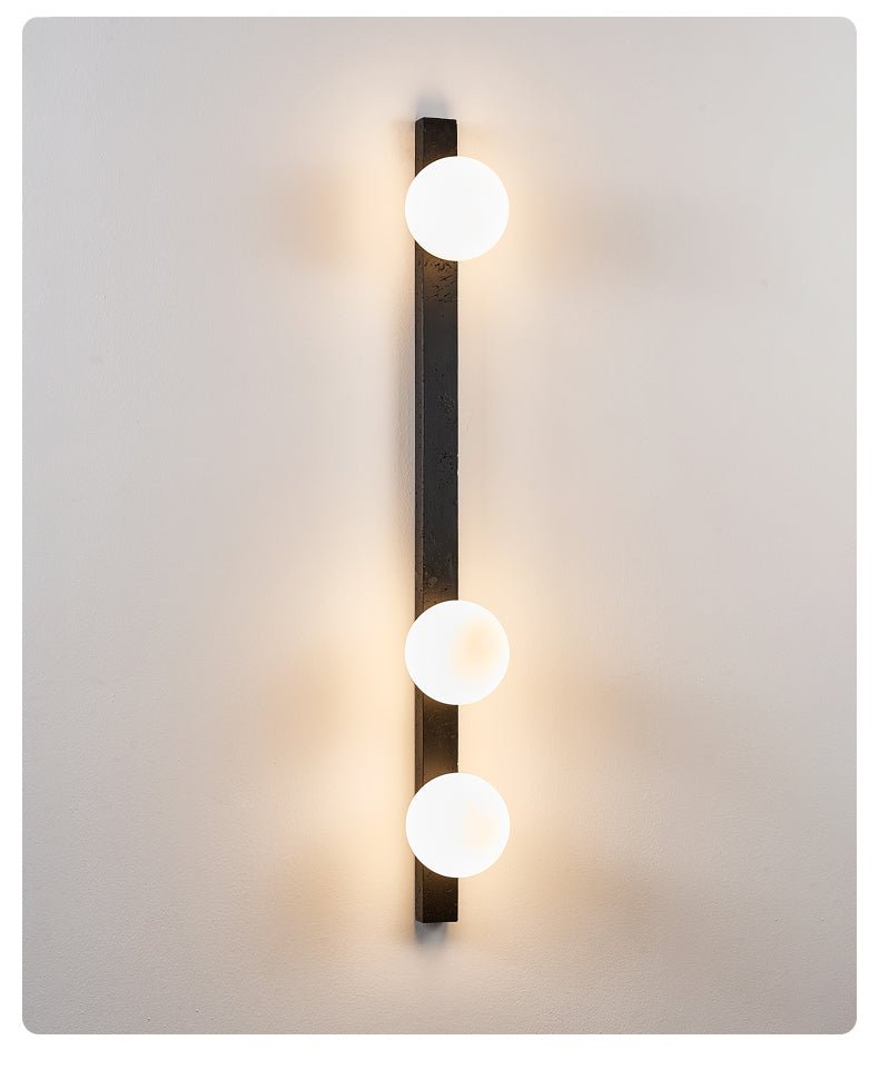 Balanced Globe Wall Sconce in Black Travertine and Opal Glass