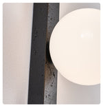 Balanced Globe Wall Sconce in Black Travertine and Opal Glass